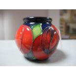 A Moorcroft Pottery Spherical Vase, decorated with the 'Red Rose' design by Emma Bossons, shape 55/