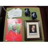 A Framed Photographic Portrait, with autograph of Luciano Pavarotti (unverified), associated mugs,