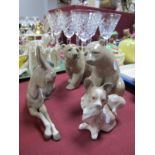 Two Lladro Figures of Bears, Lladro figure of a donkey and a dog. (4)