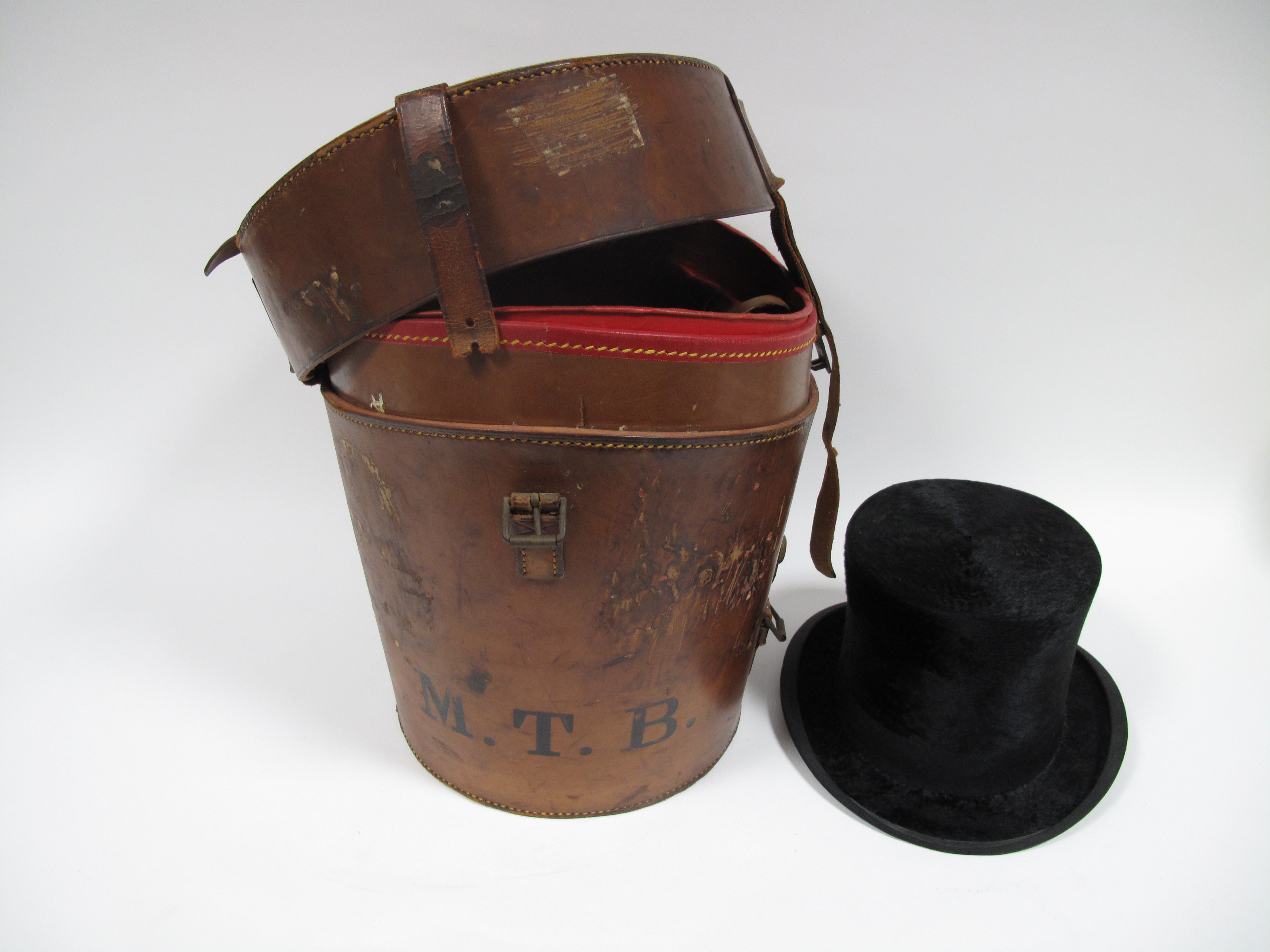 An Early XX Century Silk Top Hat, retailed by "Woodroww, 45 Gordon St, Glasgow", cream silk lined