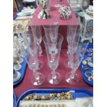 A Set of Nine Igor Carl Fabergé Crystal Champagne Flutes, the stem as frosted 'Kissing Snow