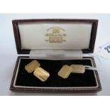 A Pair of 9ct Gold Gent's Cufflinks, in a fitted case.