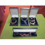 Blue, Brown, Red and White Diamanté Necklaces, all boxed:- One Tray