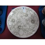 A Moorcroft Pottery Unpainted Tube-Lined Master Anemone Tribute Plate, shape 783/10 26cm diameter.