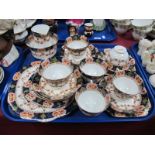 An Early XX Century St. Michael China Six Setting Tea Service, Imari borders above swags and pendant