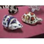 Two Royal Crown Derby Imari Paperweights, Hedgehog and a tortoise both with gold stopper. (2)