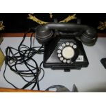 A 1920's Black Bakelite G.PO Telephone, No. 164 H.39/234, with slide tray (rewired).