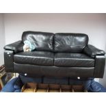 A Tesco Black Leather Two Seater Settee, on block legs.