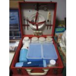 WITHDRAWN - A 1960's Sirram Picnic Case, with contents, in red.