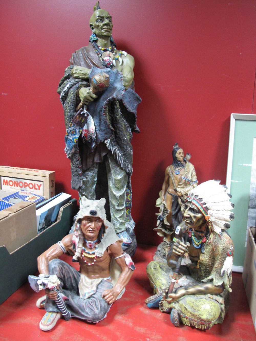 A Large Resin Figure of a Mohican, approximately 86cm high, standing and Red Indian Warriors.