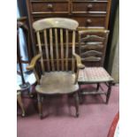 A XIX Century Ash Elm Armchair, with rail supports, shaped arms on turned legs, united by