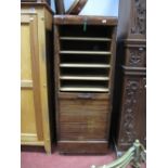 A 1930's Freestanding Office Filing Cabinet, with roll tambour front concealing trayed interior,