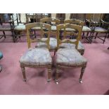 A Set of Four XIX Century Oak Bar Back Dining Chairs, on turned legs.