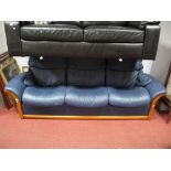 A Stressless Three Seater Reclining Sofa, fitted with individually reclining seats, shaped arms,