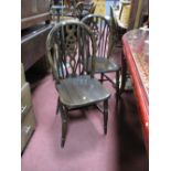 Six Wheelback Windsor Dining Chairs, including two carver chairs, all on ring turned 'H' stretchered