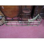 An Early XX Century Brass Fender, with twist rail supports; together with brass fire grate front.