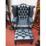 A Blue Leather Wing Armchair, with a button back, stud decoration on cabriole leg; together with a