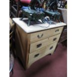 An Early XX Century Walnut Chest of Drawers, with three long drawers on bracket feet.