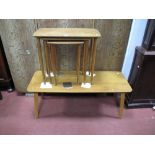 A 1960's Teakwood Rectangular Shaped Coffee Table; together with a nest of tables. (2)