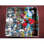 A Collection of Approximately Fifteen Circa 1970's Schleich/Peyo Plastic Model Smurfs, later