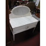 An Early XX Century White Painted Wash Stand, with marble top and oval inset back.