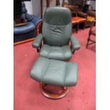 A Stressless Reclining Armchair, in stitched green leather, with matching foot rest. (2)