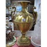 A Gilt Effect Twin Handled Vase, of ovoid form, applied foliate and bead work borders, scroll
