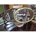 An Oval Mahogany Dressing Mirror; gilt oval wall mirror. (2)