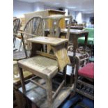 An Oak Stool, on stretchered splayed supports, an oak occasional table, wavy edge on barley twist