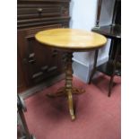 A XIX Century Mahogany Pedestal Table, with a circular top, turned pedestal splayed legs.