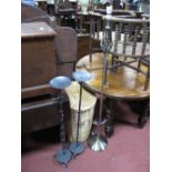 A Standard Lamp, pair of floor standing candle holders, wicker basket. (4)