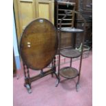 A 1920's Oak Folding Table, on barley twist supports, Edwardian inlaid mahogany folding cake