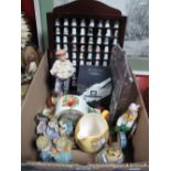 A Quantity of China Thimbles, (in two display racks), resin farmer model, model clown, ballerinas,