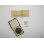 Lusitania Commemorative Medal, in original box, with leaflet; WWII War Medal, no ribbon.