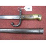 A Mid to Late XIX Century French Gras Bayonet (dated 1879), in metal scabbard. "T" section blade