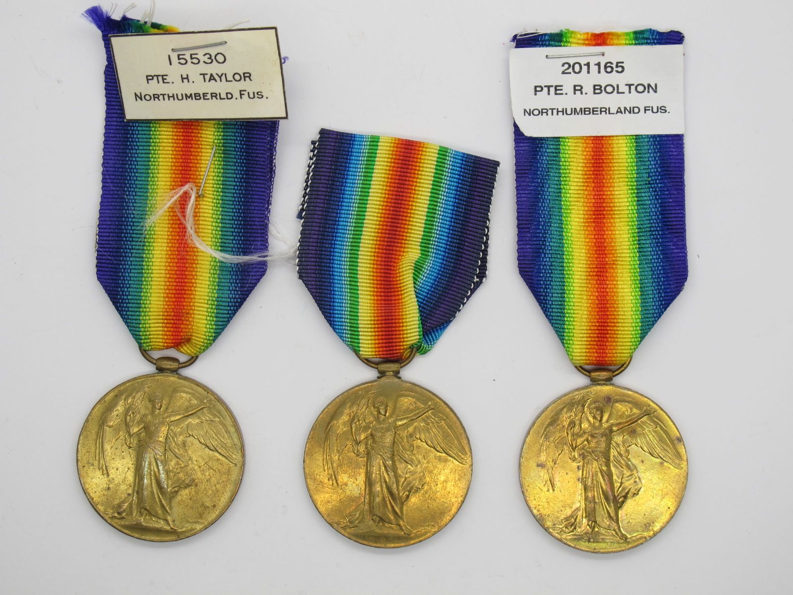 Three WWI Victory Medals, to 15530 private H. Taylor Northumberland Fusilier's 201165 Private R.