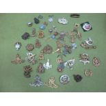 Assorted WWII Cap Badges, (over thirty), some damaged, three plastic ones. Sample King's