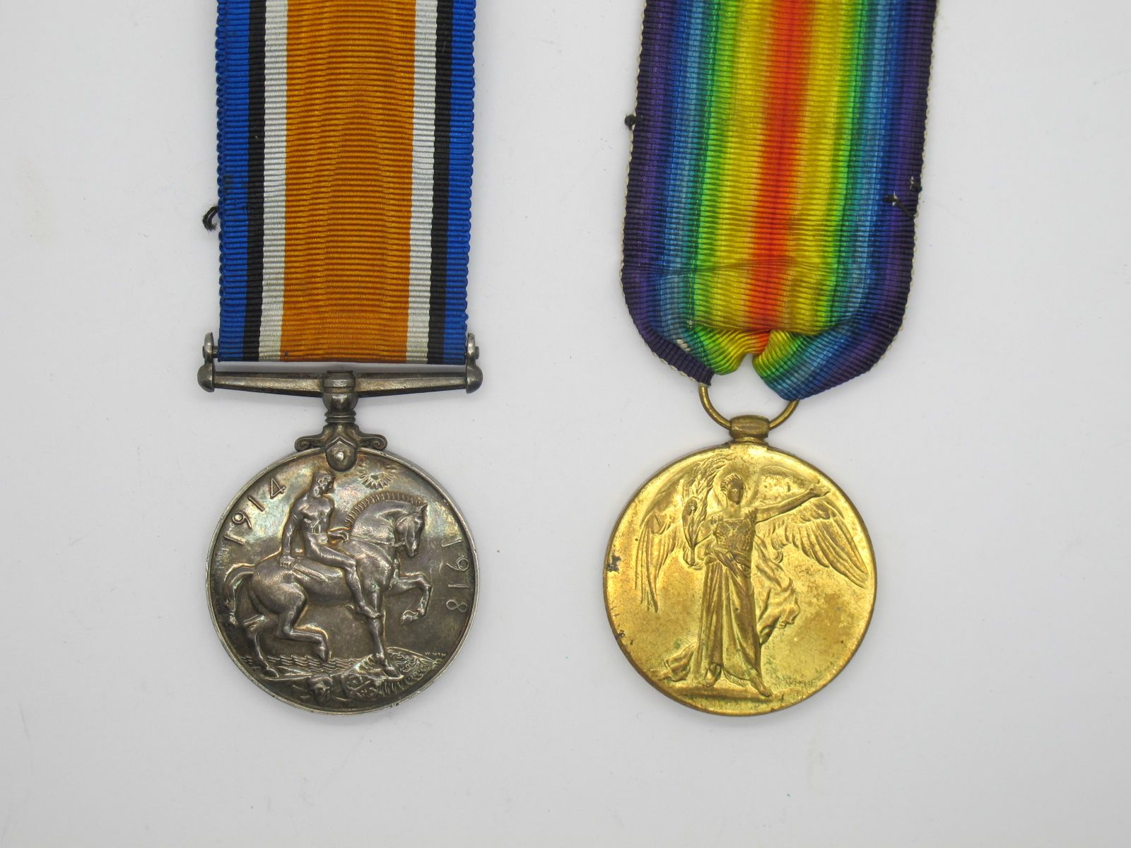 A WWI Pair of Medals, consisting of War and Victory Medals to 291858 Private H. Woodbridge Middlesex