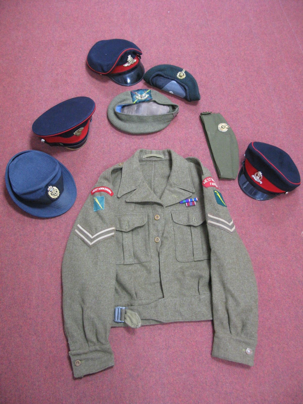 A Quantity of 1949 and Later British Military Uniform Items, including army tunic, caps and berets.