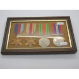 A WWII Group of Four Medals, consisting of 1939/45 Star, Africa Star, War and Defence Medals,