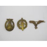 Three Reproduction German Third Reich Badges.