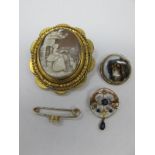 A XIX Century Oval Shell Carved Cameo Brooch, depicting seated female with dog beside a building,