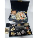 Assorted Costume Jewellery, including brooches, bangle, beads, etc contained in a jewel case.