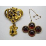 A Garnet Set Brooch, composed of four uniform circular cabochons; Together with A XIX Century