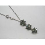 A 9ct White Gold Alexandrite Triple Cluster Drop Pendant, claw set throughout, on 9ct white gold