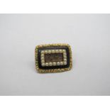 A XIX Century Mourning Brooch, of rectangular form with central glazed hairwork panel, inscribed