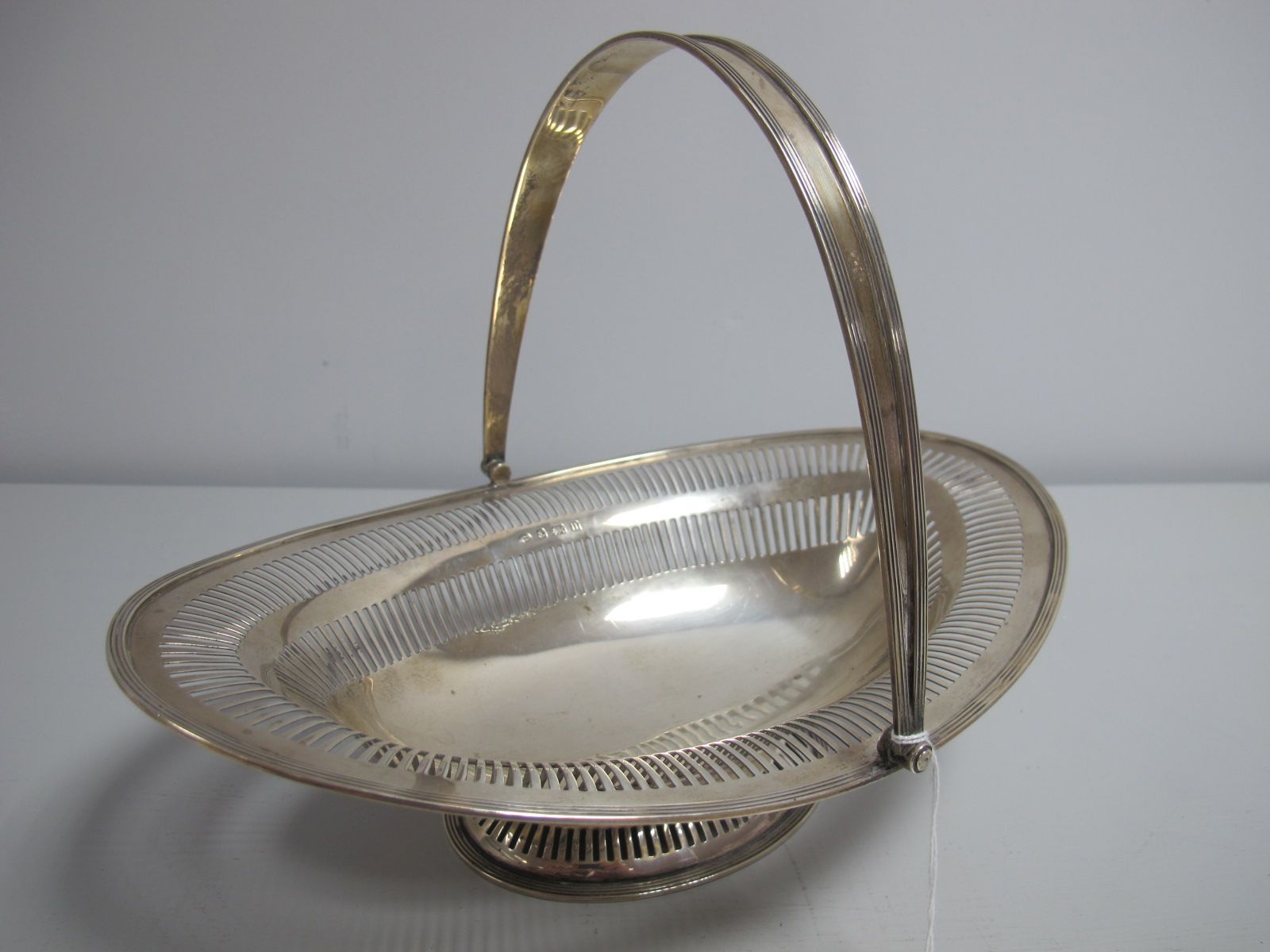 A Hallmarked Silver Swing Handled Dish, Alex Clark Co Ltd, Birmingham 1912, of oval form,