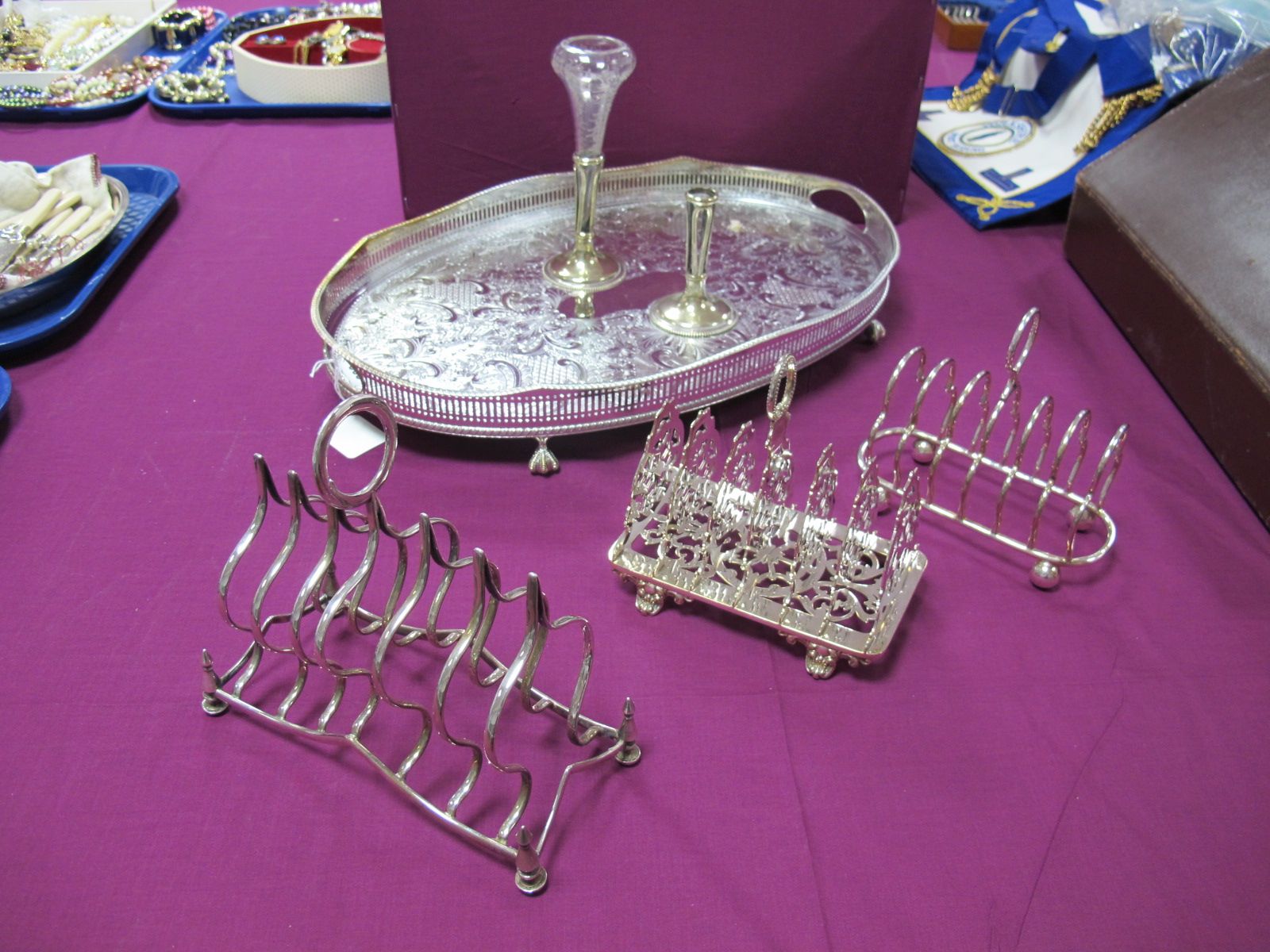 A Large Seven Bar Toast Rack, of pointed design with high central loop handle; together with a