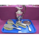 A Hallmarked Silver Backed Four Piece Dressing Table Set, each allover engine turned; together