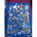 Assorted Costume Brooches, and clip earrings:- One Tray